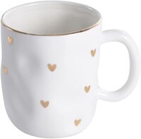 white cup with gold hearts