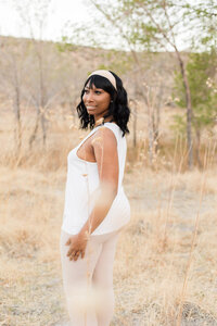 A captivating portrait of a woman surrounded by the enchanting beauty of the woods