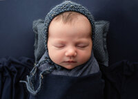 Mum and Newborn Baby at professions phtography session by newborn photographer Lauren Vanier