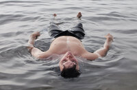 Man floating in the dead sea