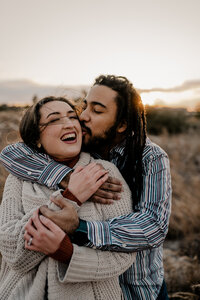 couple embracing on the beach