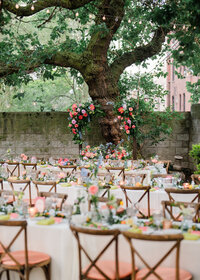 Luxury wedding in Chicago with floral abundant tables set in a beautiful courtyard
