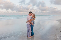 Couple gets photos taken on Indian Rocks Beach by St. Pete Photographer