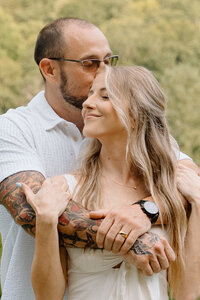 couple embracing in the mountains