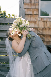 Artistic 35mm film photo of couple embracing during sunset on their wedding day