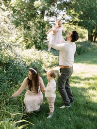 Candid outdoor family portrait showcasing work-life connection for Seattle wedding photographer Natalie Jayne by Ashley Cox Photography