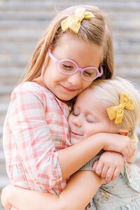 siblings hugging during fall mini session in Warrenton, VA