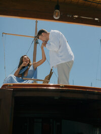 Cinematic Marin County couples photography on a boat. Romantic, fashion-forward editorial photography.