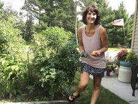 Penny holding vegetables from her garden