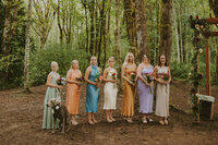 woodsy colorful bridal party at wedding