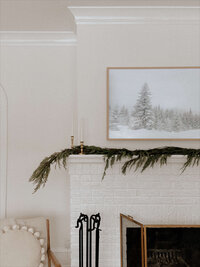 cozy fireplace decorated for the holidays