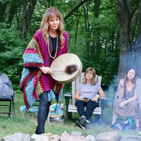shamanic practioner Dana Haines with feather and sage in New York at the Omega Institute promoting womens wellness retreat