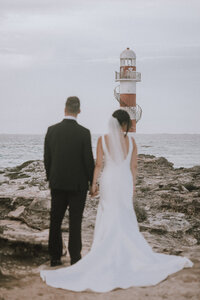 Destination wedding at the lighthouse of Hyatt Ziva in Cancun, Mexico.