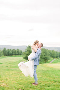 Couple smiles on their wedding day photographed by Baltimore Wedding Photographer, Cait Kramer