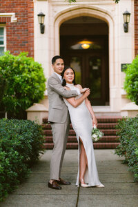 Bride and groom walk up memorial steps at their DC wedding