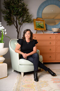 business professional in a suit top getting professional headshot