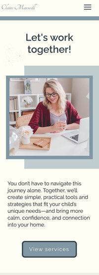 Iphone mockup of Claire Maxwell website with image of Claire sitting at desk smiling