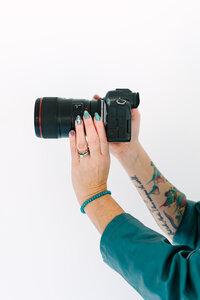woman holding camera
