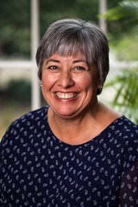 Headshot of Mary Jean Leonardi, MAT, MMS, PA-C, stating that Erich Fogg has been an “invaluable partner” to their university