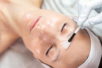 Professional skin care consultation with esthetician at Gloss RVA