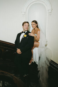 Editorial wedding portrait of bride and groom at Takk House in Troy, New York with vintage styling and film tones