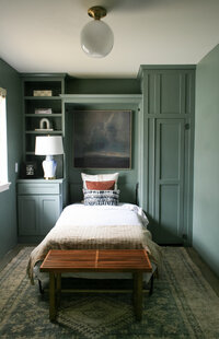 Cool toned bedroom with blue built-in cabinets, designed by Hope Miriam Designs in DFW