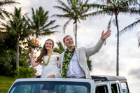 wedding photography on the big island hawaii with couple driving down the road