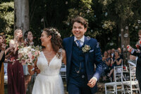 Wedding couple leaving the altar after wedding ceremony.