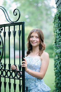 Beautiful image from a senior portrait session in a garden setting. 