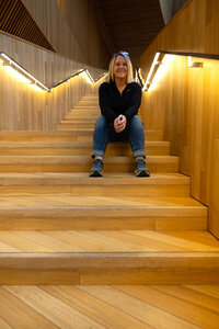 Aubre creating a mood board by collaging photos and color swatches