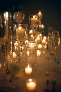 Detail photo of candles lit on reception tables taken by east coast photographer Shelby Ann Photos