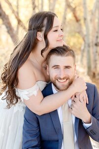 A bride and groom on their outdoor wedding day.