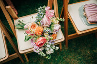 bridal bouquet on a ceremony chair