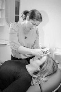 Black and white headshot of Tamsen working, founder of Natural Beauty Ink.
