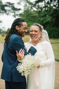 bride and groom in expansive field