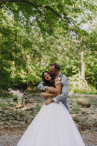 bride and groom pose for photos after wedding in lancaster pa
