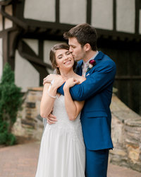 couple hugs at their club at hillbrook wedding  in Chagrin Falls
