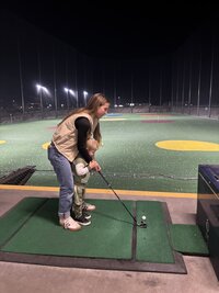 family golfing
