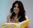 Meera Patel reading a book, brand and web designer blending storytelling with global strategy.