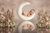 A newborn baby girl with a boho rustic moon background in Summerville, South Carolina.