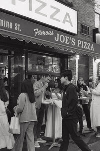 Candid wedding night pizza run captured by a Pennsylvania wedding photographer