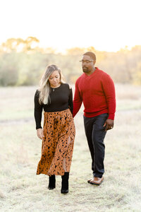 couple holding hands at arbor hills nature preserve by tonaya noel photography