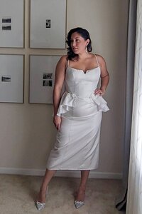 Midi-length wedding dress with peplum