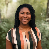 headshot of Patrice smiling