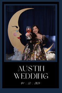 A photo print out of a woman holding up a glass of wine in front of a moon prop, representing an image from the Birdie Booth, an Eugene photo booth rental.