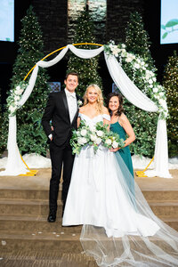 Eleanor Stenner with bride and groom at Birmingham wedding 