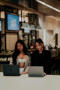 Kemotion team reviewing a website together, ready to help with web design for service-based businesses.