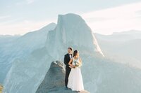 wedding couple embracing at the beachj