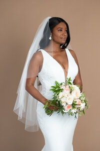 Bride wearing a two layer waterfall style veil