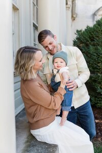 Expecting couple snuggled in close for their Richmond maternity session